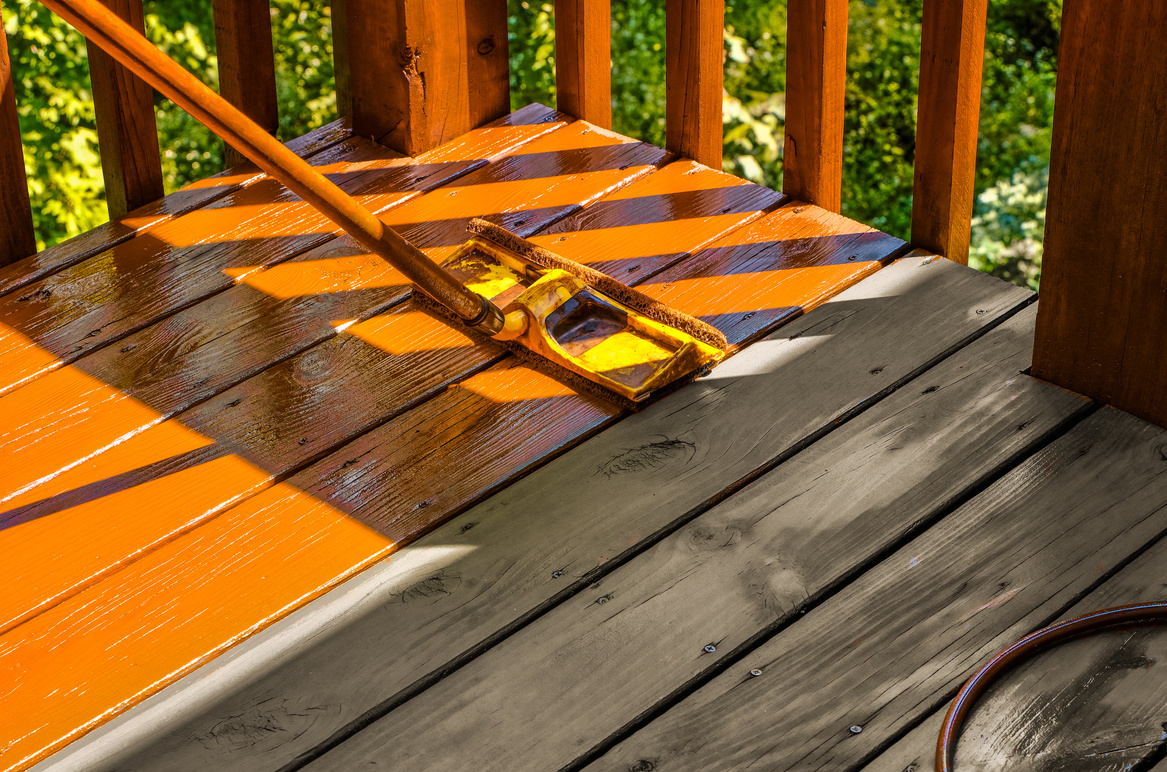 Staining wooden deck with paint roller